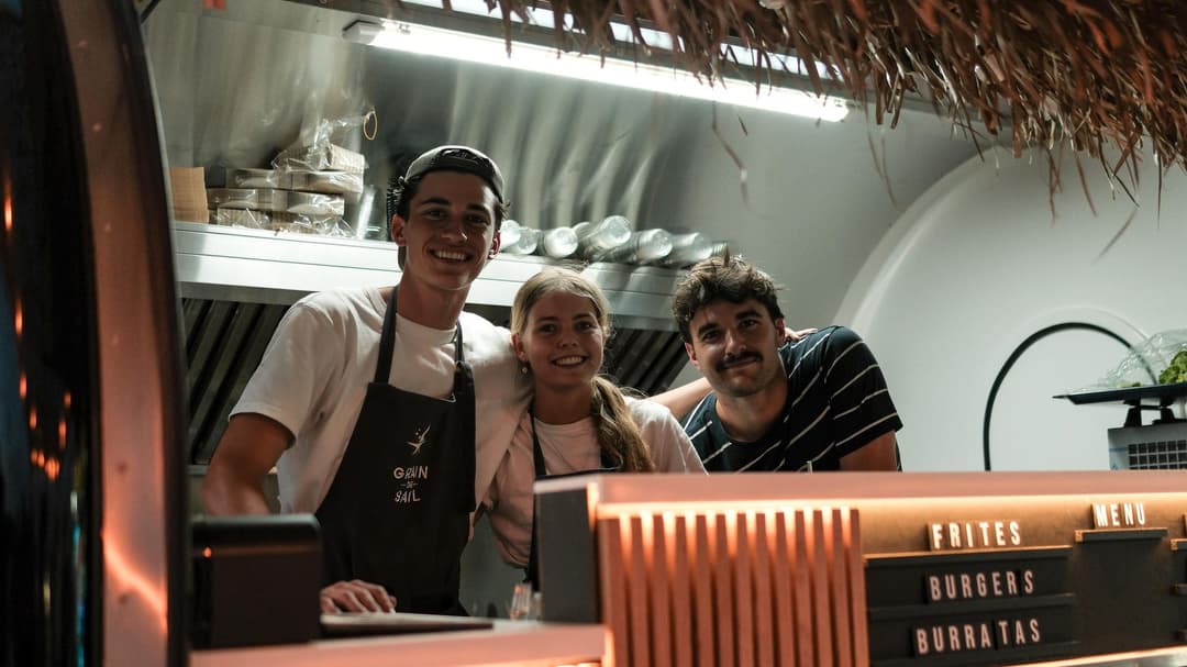 A team at work in a food truck trailer